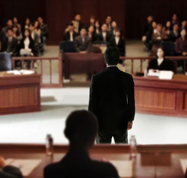 Back of Digital Forensic Neutral speaking to magistrate in courtroom, law adjustment for Legal battles for legitimacy concept.